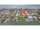 Breathtaking aerial view featuring the community, nearby ocean and desirable waterfront location at 113 16Th St, Belleair Beach, FL 33786