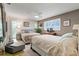 Comfortable bedroom with two beds, plantation shutters, and soft lighting creates a cozy retreat at 113 16Th St, Belleair Beach, FL 33786