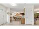 Inviting foyer with tile flooring, leading to a bright and airy living space with natural light at 113 16Th St, Belleair Beach, FL 33786