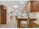 Spacious kitchen boasts ample cabinet space, modern appliances, and a cozy breakfast nook with bright light at 113 16Th St, Belleair Beach, FL 33786