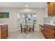 Cozy kitchen nook with a bay window offering natural light and a view of the outdoors at 113 16Th St, Belleair Beach, FL 33786