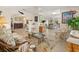 Inviting living room with multiple seating areas, tile floors, and plenty of natural light at 113 16Th St, Belleair Beach, FL 33786