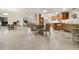 Bright living space with tile floors, dining and living area, and easy access to the kitchen at 113 16Th St, Belleair Beach, FL 33786