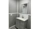 Bathroom with new vanity, sink, and fixtures at 11351 Edison Ave, New Port Richey, FL 34654