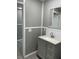 Bathroom with new vanity, sink, and fixtures at 11351 Edison Ave, New Port Richey, FL 34654
