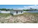 View of a large backyard with white fence at 12456 Spreading Oak Dr, Spring Hill, FL 34609