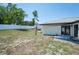 Expansive backyard featuring privacy fence, providing a secure outdoor space at 12456 Spreading Oak Dr, Spring Hill, FL 34609