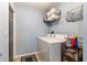 Efficient laundry room with a modern washer and dryer, complemented by ample storage at 12456 Spreading Oak Dr, Spring Hill, FL 34609