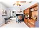 Inviting office featuring a custom built-in bookshelf, a modern desk setup and decor at 12456 Spreading Oak Dr, Spring Hill, FL 34609