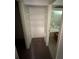 View of closet with shelving next to the bathroom at 135 Pinewinds Blvd, Oldsmar, FL 34677