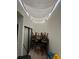 Messy indoor area with multiple chairs at 135 Pinewinds Blvd, Oldsmar, FL 34677