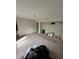 Empty living room with closet and large carpet at 135 Pinewinds Blvd, Oldsmar, FL 34677