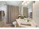 Cozy bathroom featuring a shower and vanity with generous counter space at 13813 Sigler St, Riverview, FL 33579