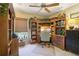 Comfortable home office with custom built-in shelving at 13813 Sigler St, Riverview, FL 33579