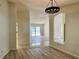 Bright living room with a seamless design flowing into the pool area, featuring wood and tiled flooring at 16517 Norwood Dr, Tampa, FL 33624