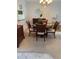 Formal dining room with wooden furniture and neutral decor at 19029 Us Highway 19 N # 2-23, Clearwater, FL 33764