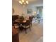 Open floor plan includes a dining area with seating and comfortable furniture at 19029 Us Highway 19 N # 2-23, Clearwater, FL 33764