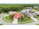 Beautiful home with tile roof, well-maintained landscaping, and convenient three-car garage in prime location at 19107 Avenue Bayonnes, Lutz, FL 33558