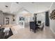Elegant dining room featuring a modern chandelier and stylish decor with large window at 19107 Avenue Bayonnes, Lutz, FL 33558