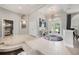 Entry foyer boasting high ceilings, tiled floors, chandelier and attractive decor at 19107 Avenue Bayonnes, Lutz, FL 33558