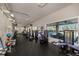 Community gym featuring modern fitness equipment with pool view from large windows at 19107 Avenue Bayonnes, Lutz, FL 33558