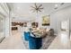 Open-concept living area with comfortable seating, bar area, and modern decor creating an inviting atmosphere at 19107 Avenue Bayonnes, Lutz, FL 33558