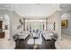 Spacious living room with elegant decor, chandelier and views to the pool at 19107 Avenue Bayonnes, Lutz, FL 33558