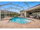 Inviting covered pool and patio area, great for entertaining and relaxing outdoors at 19107 Avenue Bayonnes, Lutz, FL 33558
