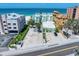 Aerial view of property near the beach and ocean with street access and parking at 19530 Gulf Blvd # 4A, Indian Shores, FL 33785