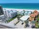 Aerial view of property near the beach and ocean with street access and parking at 19530 Gulf Blvd # 4A, Indian Shores, FL 33785