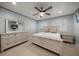 Bright bedroom featuring light walls, wood ceiling with fan, and white wood furniture at 19530 Gulf Blvd # 4A, Indian Shores, FL 33785