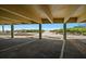 Covered parking area with a view of the beach and boardwalk at 19530 Gulf Blvd # 4A, Indian Shores, FL 33785