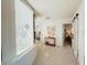 Bright hallway with recessed lighting connects the home at 1980 Forked Creek Dr, Englewood, FL 34223