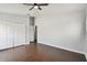 Spacious bedroom features light-colored walls and wood-look floors at 27012 Sea Breeze Way, Wesley Chapel, FL 33544