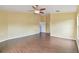Spacious bedroom with wood flooring and a ceiling fan for added comfort at 27012 Sea Breeze Way, Wesley Chapel, FL 33544