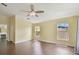 Comfortable main bedroom boasts a ceiling fan and lots of natural light at 27012 Sea Breeze Way, Wesley Chapel, FL 33544