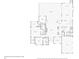 Floor plan of home layout, including primary bedroom, kitchen, living spaces, and garage at 2769 St Andrews Blvd, Tarpon Springs, FL 34688