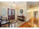 Grand foyer with decorative double doors, high ceilings, and elegant marble floors at 2769 St Andrews Blvd, Tarpon Springs, FL 34688