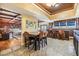 Gourmet kitchen seamlessly connects to the breakfast bar, dining nook, and living room, perfect for entertaining at 2769 St Andrews Blvd, Tarpon Springs, FL 34688