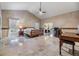 Spacious main bedroom featuring vaulted ceiling and travertine flooring at 2769 St Andrews Blvd, Tarpon Springs, FL 34688