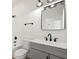 Bright bathroom features single sink vanity, modern fixtures, and combined tub and shower at 2814 Graphite Ct, Valrico, FL 33594