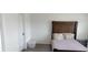 Another view of the bedroom with neutral colors and ample natural light at 2880 Gumbo Limbo Dr, Wimauma, FL 33598