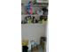 Pantry with an array of household supplies and cleaning products on shelves at 2880 Gumbo Limbo Dr, Wimauma, FL 33598