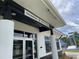 Racquetball and activity room entrance with posted hours of operation at 29228 Yarrow Dr, Wesley Chapel, FL 33543
