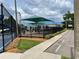 Recreational area including a playground and workout area at community park at 29228 Yarrow Dr, Wesley Chapel, FL 33543