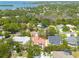 Expansive aerial view showcasing the neighborhood with lush greenery and convenient access to the waterfront at 315 Ridge Rd, Palm Harbor, FL 34683