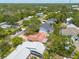 Bird's-eye view highlighting the property's location in a lush, green neighborhood with nearby amenities at 315 Ridge Rd, Palm Harbor, FL 34683