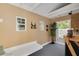 Bright bonus room offering a versatile space with natural light and easy access to the outdoors at 315 Ridge Rd, Palm Harbor, FL 34683