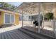Inviting outdoor deck space offering the perfect place for outdoor entertaining at 315 Ridge Rd, Palm Harbor, FL 34683