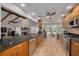 Modern kitchen featuring stainless steel appliances, granite countertops, and open layout at 315 Ridge Rd, Palm Harbor, FL 34683